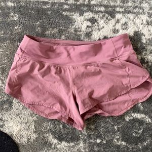 Mauve Lululemon run shorts 6